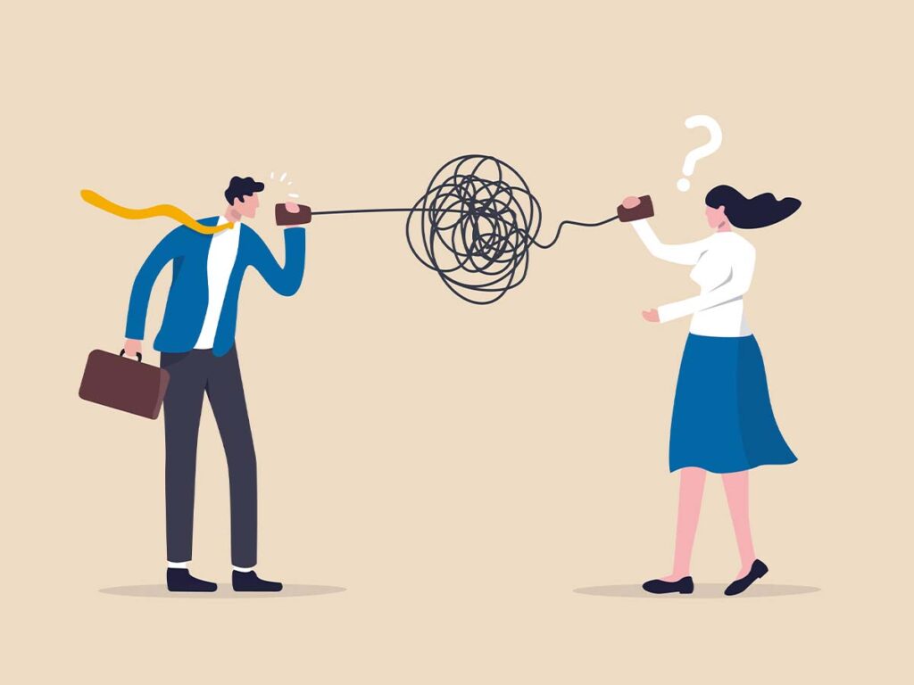 Zwei Personen kommunizieren missverständlich durch ein Telefon mit Schnur, das Symbol für falsche Kommunikation darstellt.